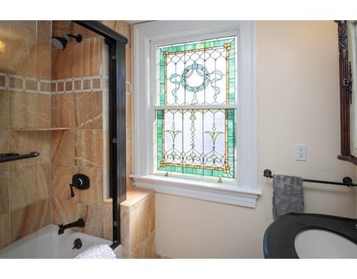 929 Beacon Street Newton, MA 02459 - Photo 29 of 36 a bathroom with a toilet and a shower