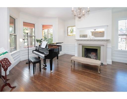 929 Beacon Street Newton, MA 02459 - Photo 3 of 36 a living room with furniture and a fireplace