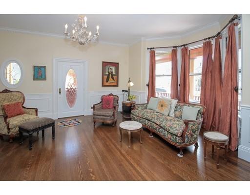 929 Beacon Street Newton, MA 02459 - Photo 4 of 36 a living room with furniture and a chandelier