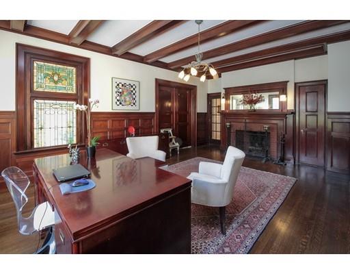 929 Beacon Street Newton, MA 02459 - Photo 6 of 36 a view of a dining room with furniture a chandelier and wooden floor