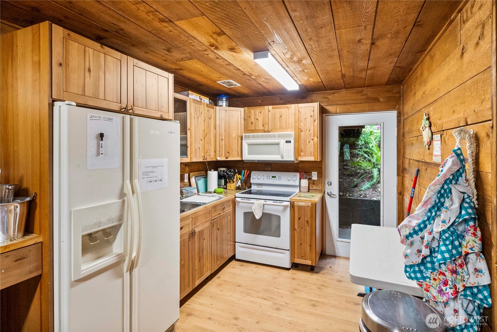 1546 Reservation Road Southeast, Unit 62 Olympia, WA 98513 - Photo 29 of 39 a kitchen with stainless steel appliances a refrigerator and a stove