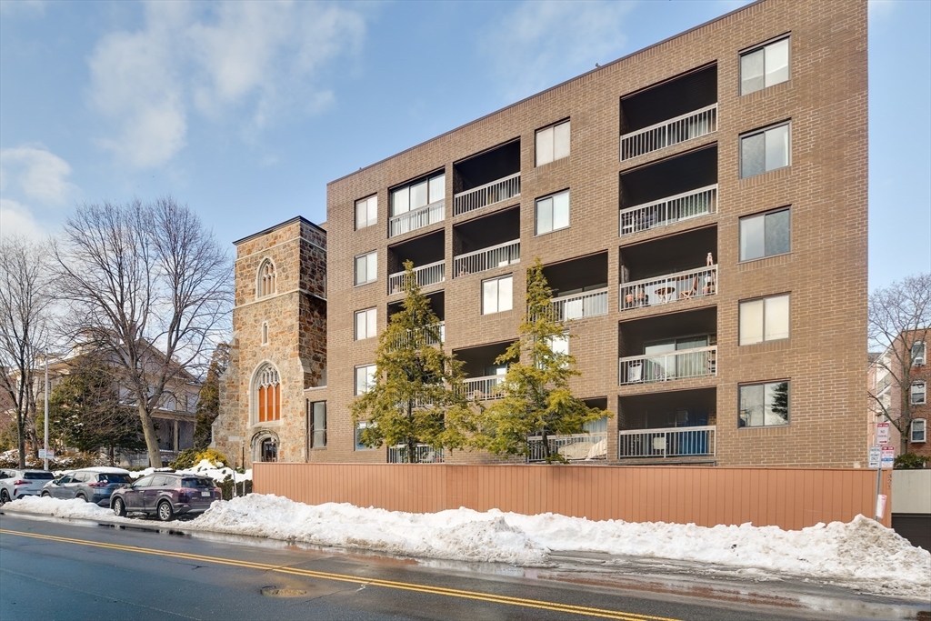 321 Harvard Street, Unit 307 Cambridge, MA 02139 - Photo 22 of 26 a view of a building and a street