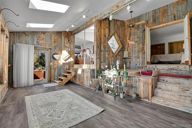 a view of livingroom with furniture and a window