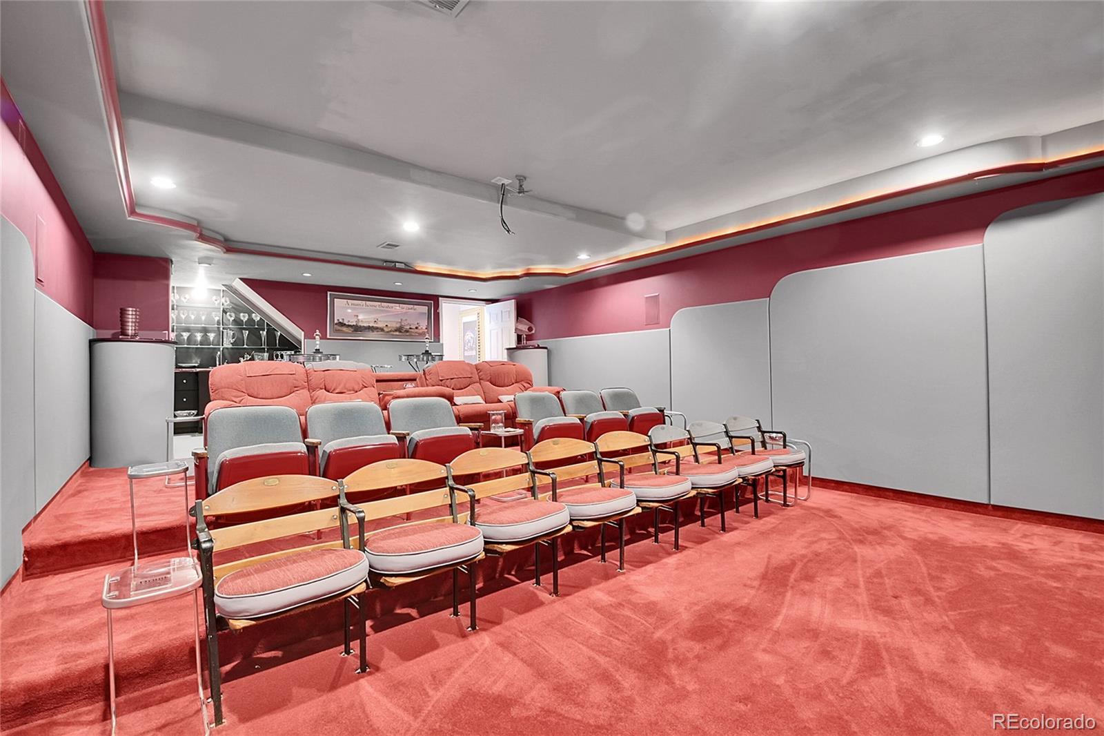 13082 South Wamblee Valley Road Conifer, CO 80433 - Photo 42 of 46 a room with lots of white furniture and chandelier