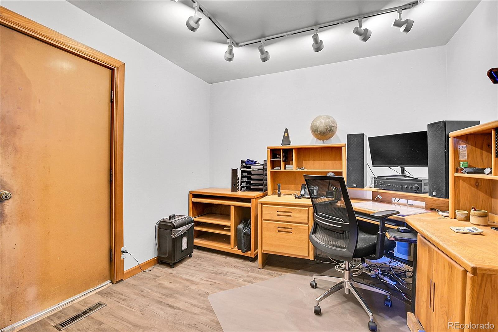 13082 South Wamblee Valley Road Conifer, CO 80433 - Photo 43 of 46 a view of a workspace with furniture and a window