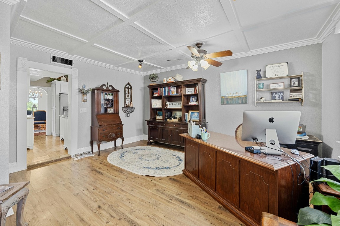 622 West 7th Street Taylor, TX 76574 - Photo 15 of 35 a view of a workspace with furniture