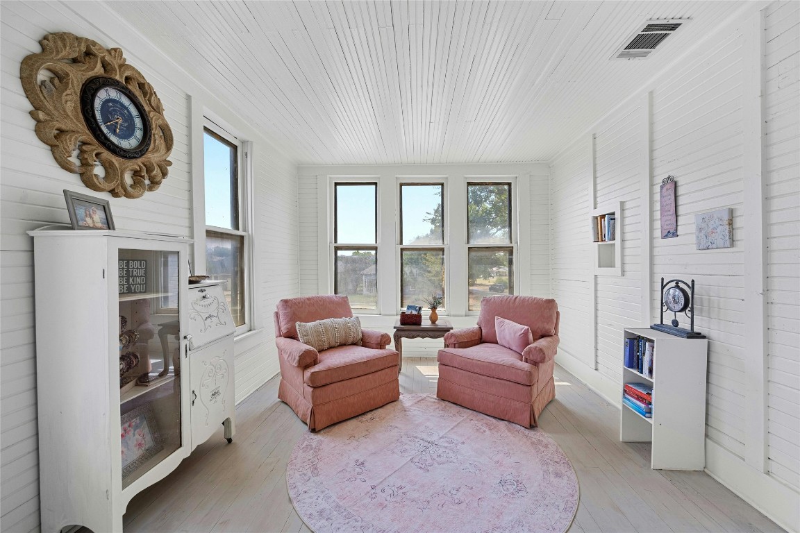 622 West 7th Street Taylor, TX 76574 - Photo 24 of 35 a living room with furniture and a window
