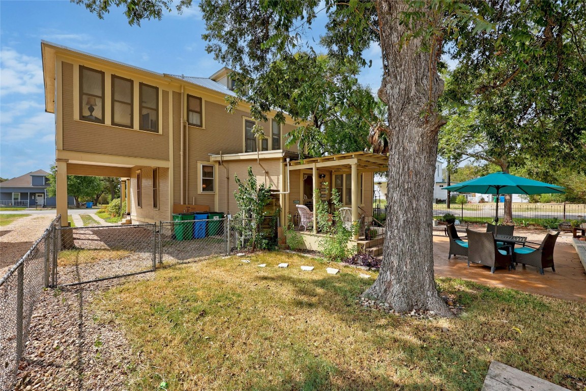 622 West 7th Street Taylor, TX 76574 - Photo 31 of 35 a view of a house with a tree in a yard