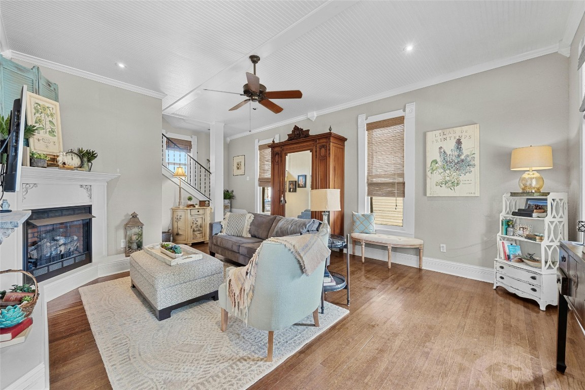 622 West 7th Street Taylor, TX 76574 - Photo 6 of 35 a living room with furniture and a fireplace