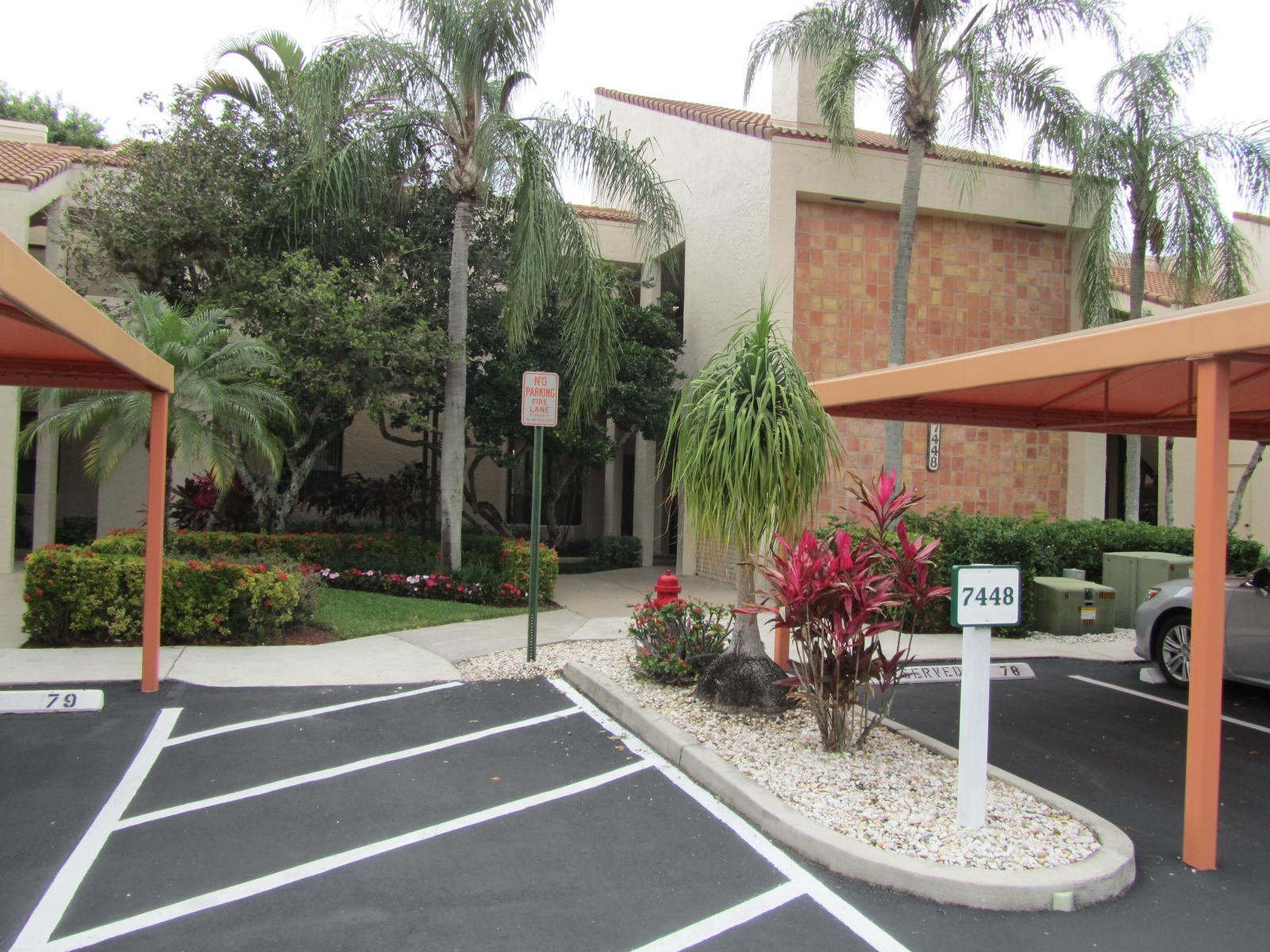 7448 La Paz Place, Unit 104 Boca Raton, FL 33433 - Photo 1 of 12 FRONT