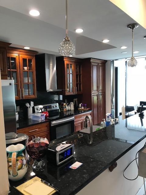 7448 La Paz Place, Unit 104 Boca Raton, FL 33433 - Photo 4 of 12 kitchen