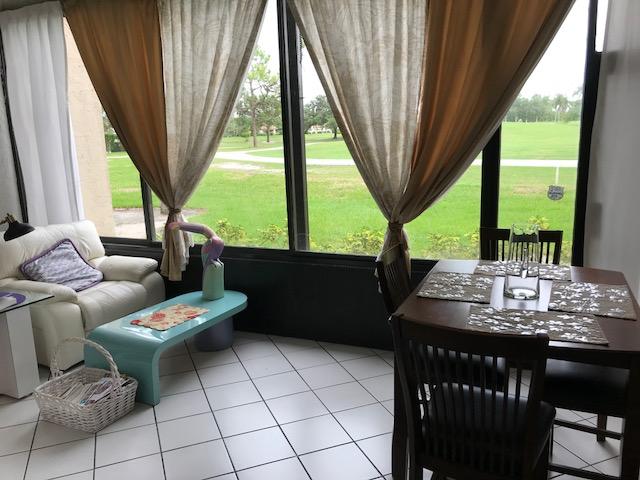 7448 La Paz Place, Unit 104 Boca Raton, FL 33433 - Photo 5 of 12 enclosed patio