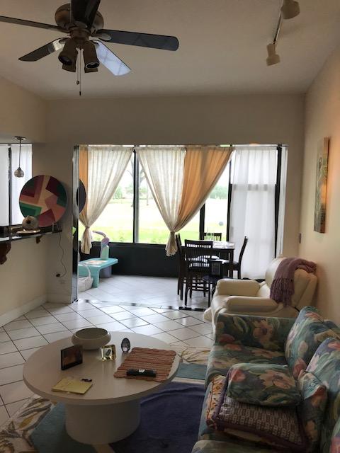 7448 La Paz Place, Unit 104 Boca Raton, FL 33433 - Photo 6 of 12 living room