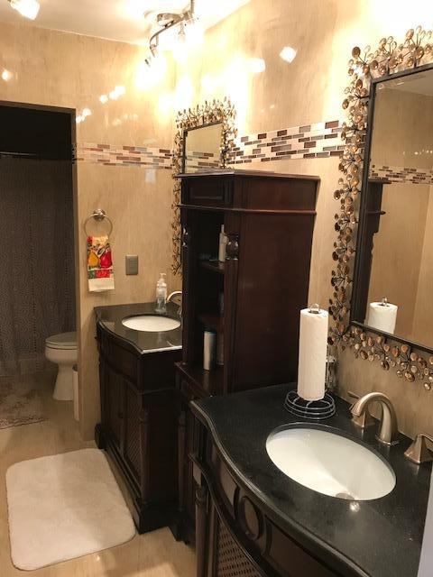 7448 La Paz Place, Unit 104 Boca Raton, FL 33433 - Photo 8 of 12 master bathroom