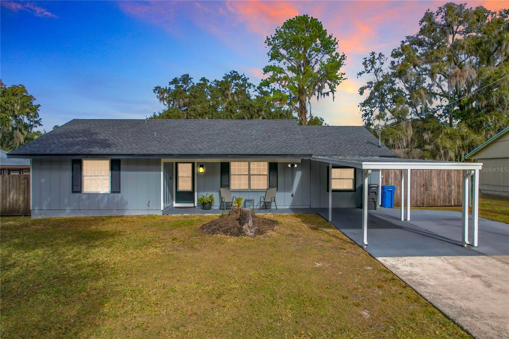 2910 Jim Johnson Road Plant City, FL 33566 - Photo 1 of 1 a front view of a house with a yard