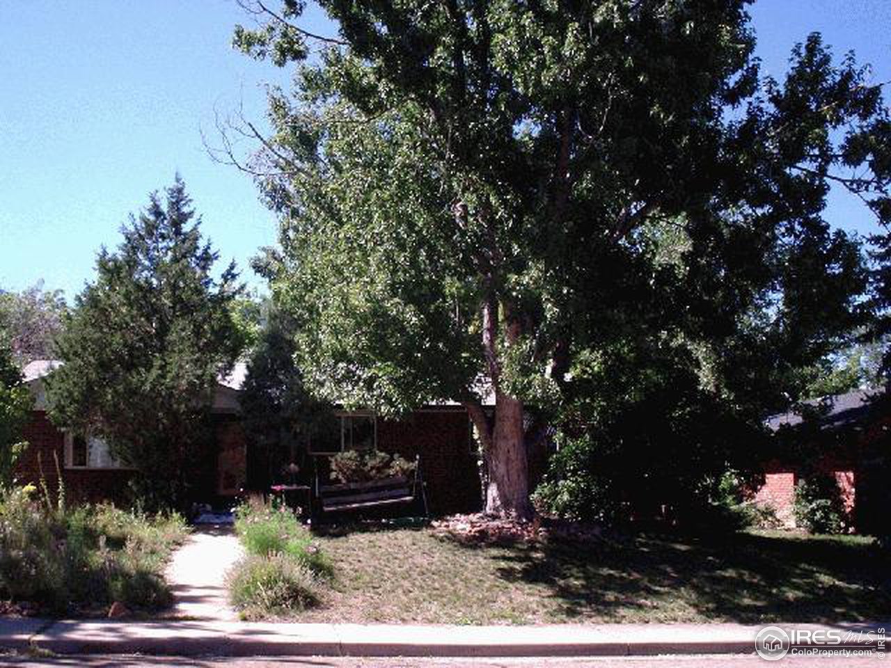 1205 Georgetown Road Boulder, CO 80305 - Photo 2 of 5 a view of backyard with a garden