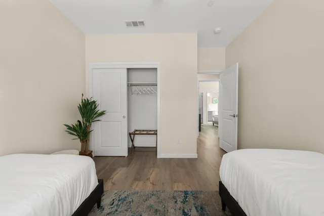 a view of a livingroom with furniture and windows