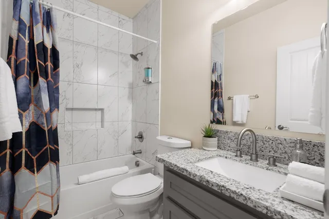 a living room with furniture or couch and a flat screen tv