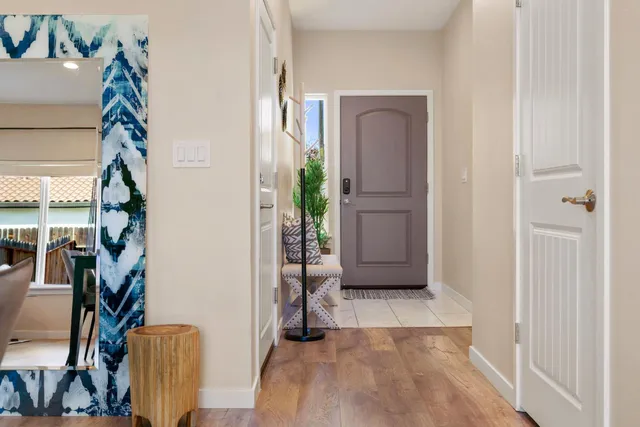 a view of a dining room with furniture window and outside view