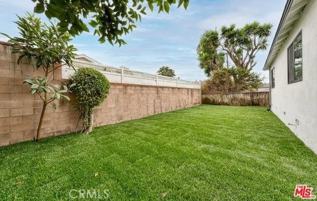 a view of a backyard with a garden