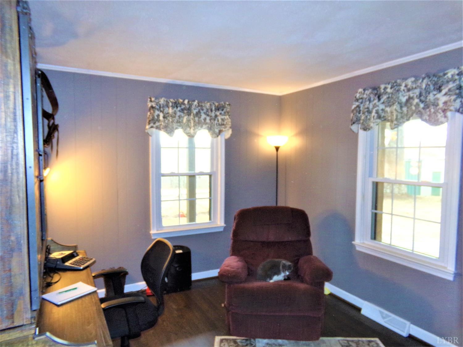 671 Countyline Road Keysville, VA 23947 - Photo 16 of 38 a room with furniture and a window
