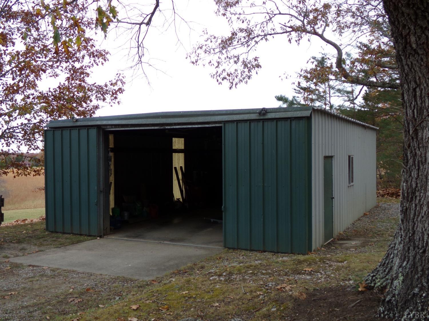 671 Countyline Road Keysville, VA 23947 - Photo 34 of 38 a backyard of a house with lots of green space