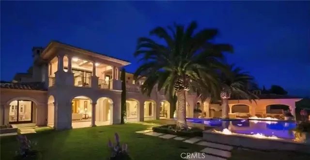 a view of a house with a swimming pool