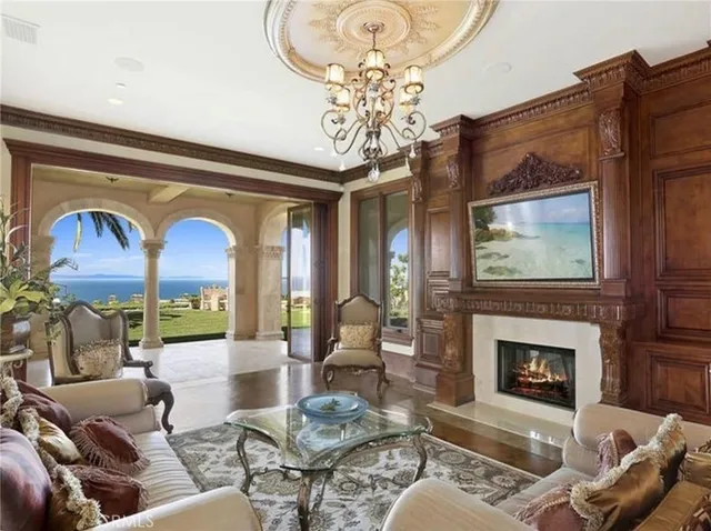 a living room with furniture and windows