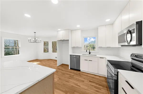 a kitchen with a sink and a window