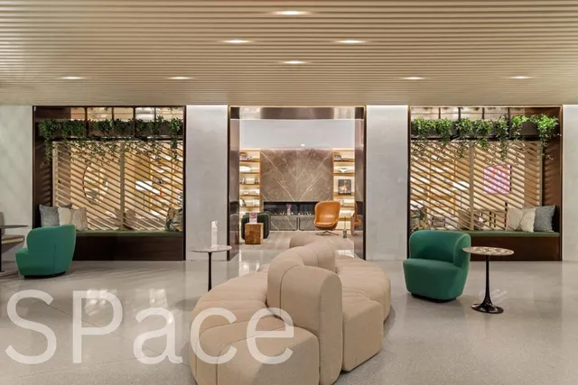 a view of a swimming pool with a yard