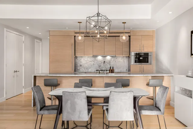 a picture of a bench in front of a wall