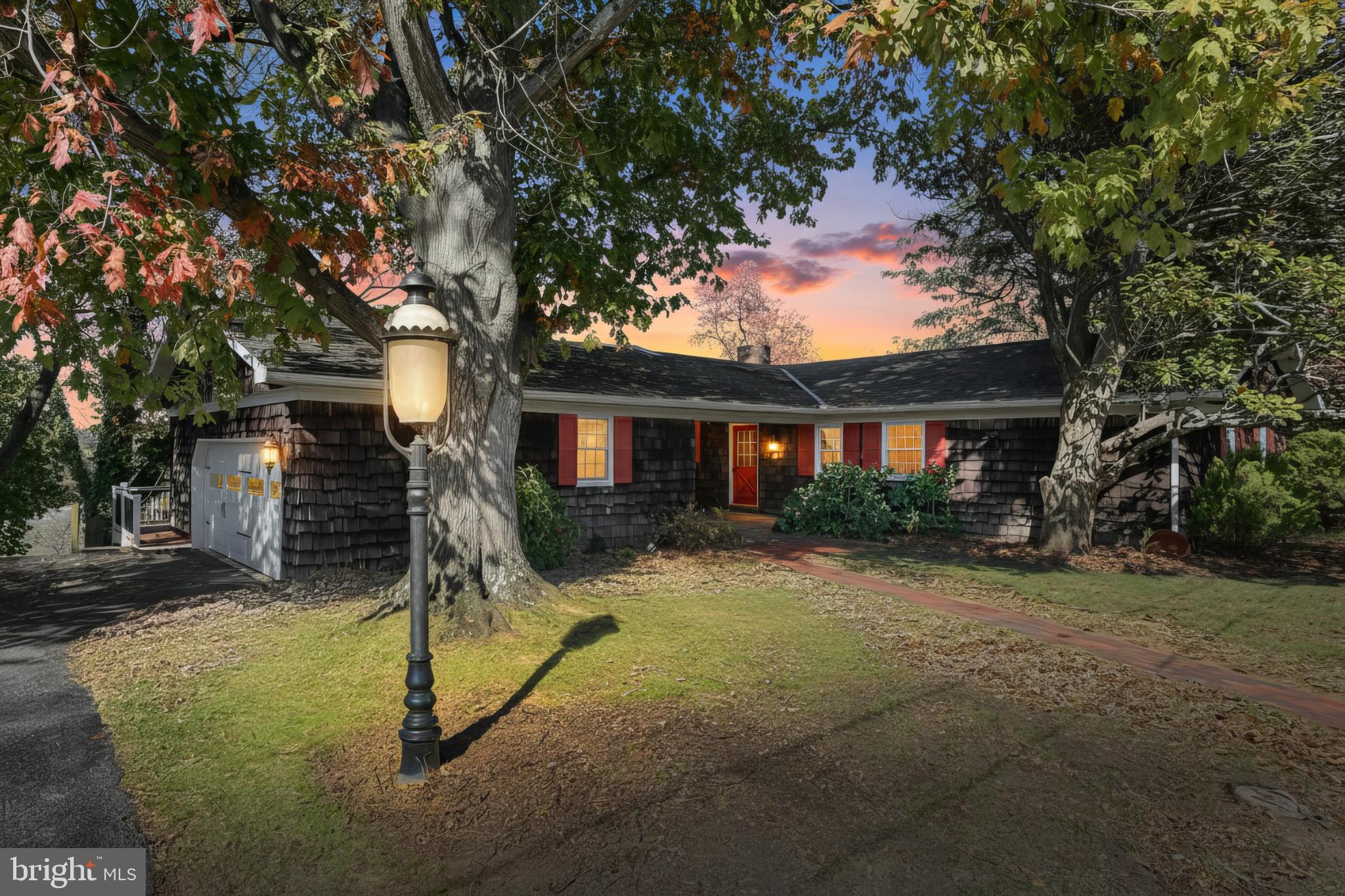 Charming home bathed in twilight hues.