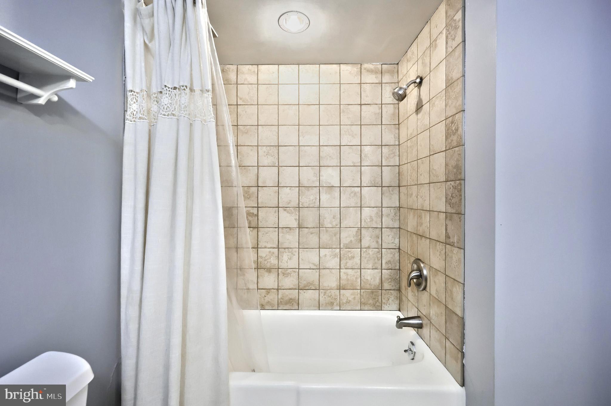 150 Ridge Avenue Glen Rock, PA 17327 - Photo 27 of 49 Main bathroom with tiled shower space.