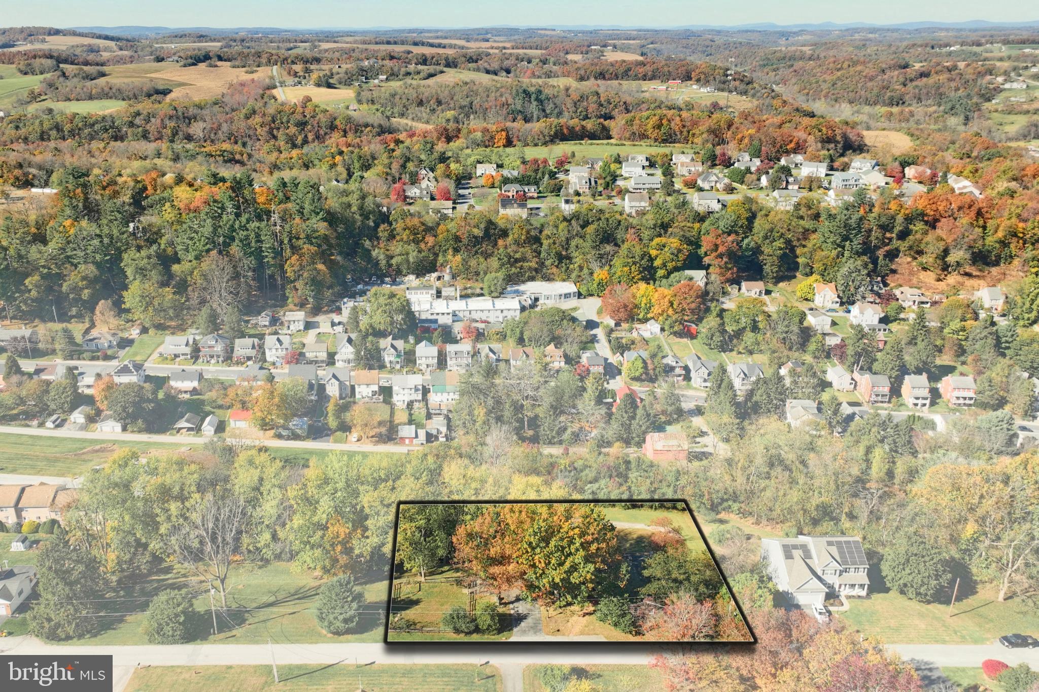 150 Ridge Avenue Glen Rock, PA 17327 - Photo 3 of 49 Scenic autumn view of a charming neighborhood.