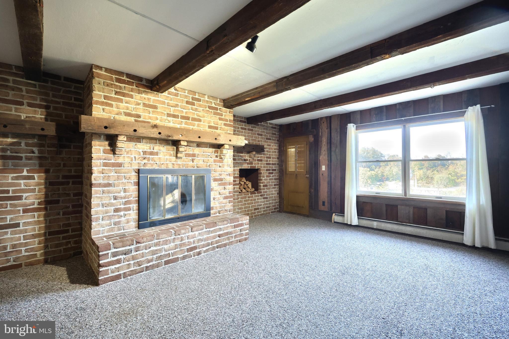150 Ridge Avenue Glen Rock, PA 17327 - Photo 42 of 49 Rustic brick wood burning fireplace.