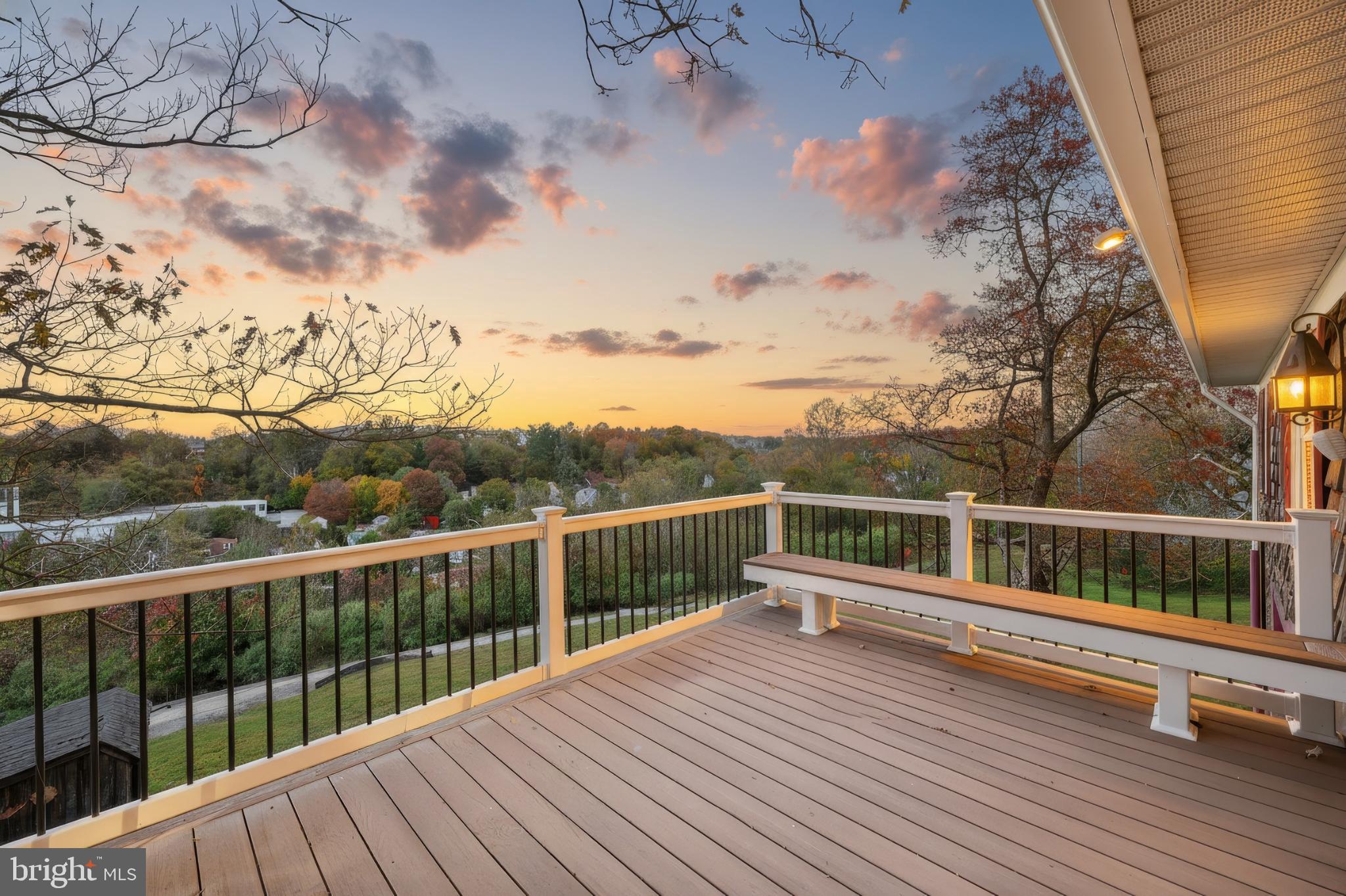 150 Ridge Avenue Glen Rock, PA 17327 - Photo 10 of 49 Serene sunset view from a charming deck.