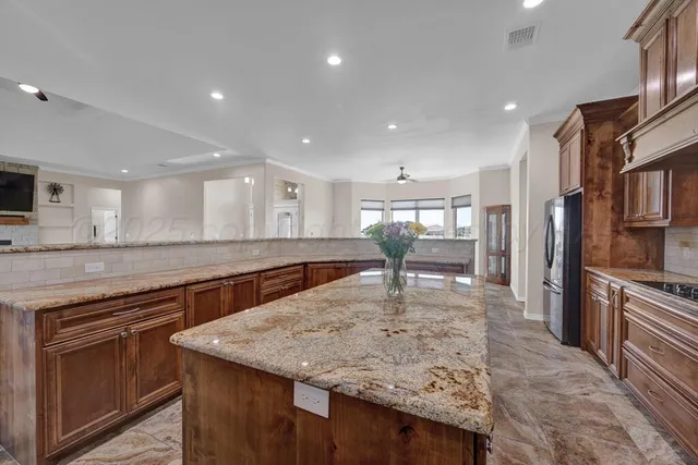 a kitchen with a stove and a sink