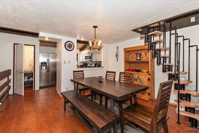 a view of a livingroom with furniture and window