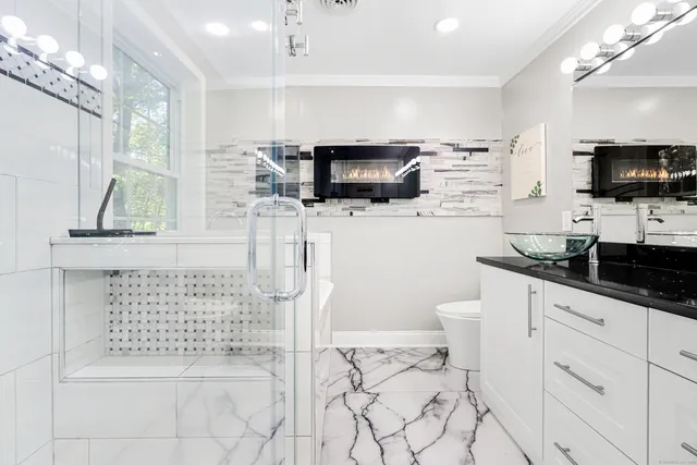 a kitchen with a sink and a stove top oven