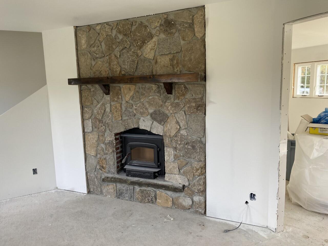 7 Chestnut Street Unity, ME 04988 - Photo 8 of 8 Stone chimney and fire insert