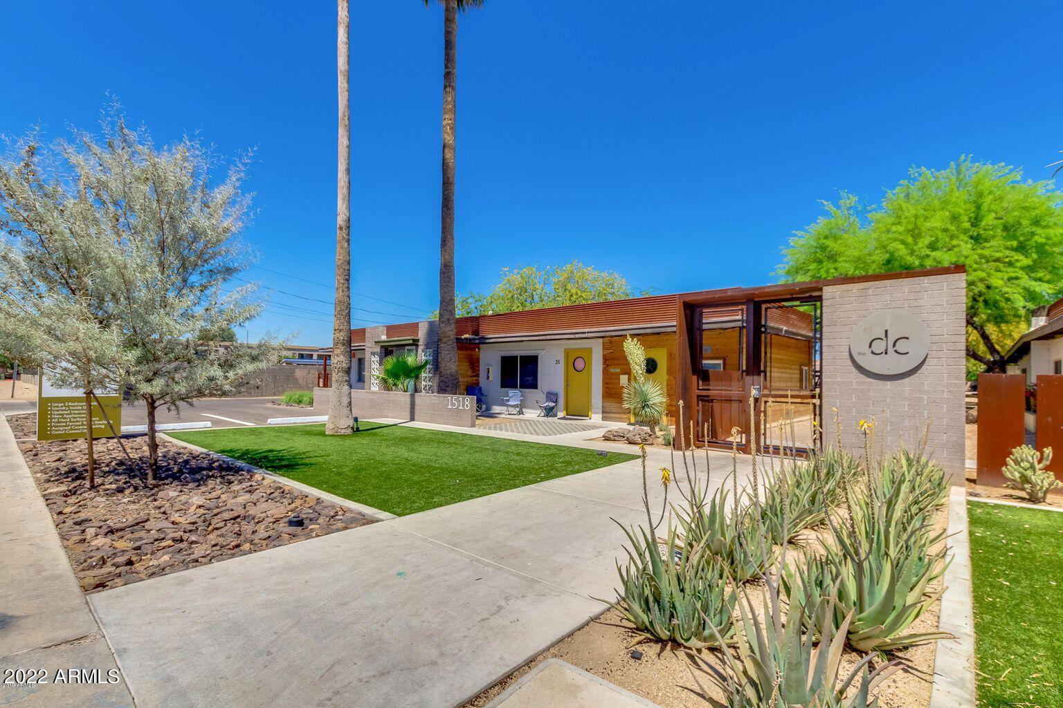 1518 West Colter Street, Unit 29 Phoenix, AZ 85015 - Photo 1 of 15 a front view of a house with garden