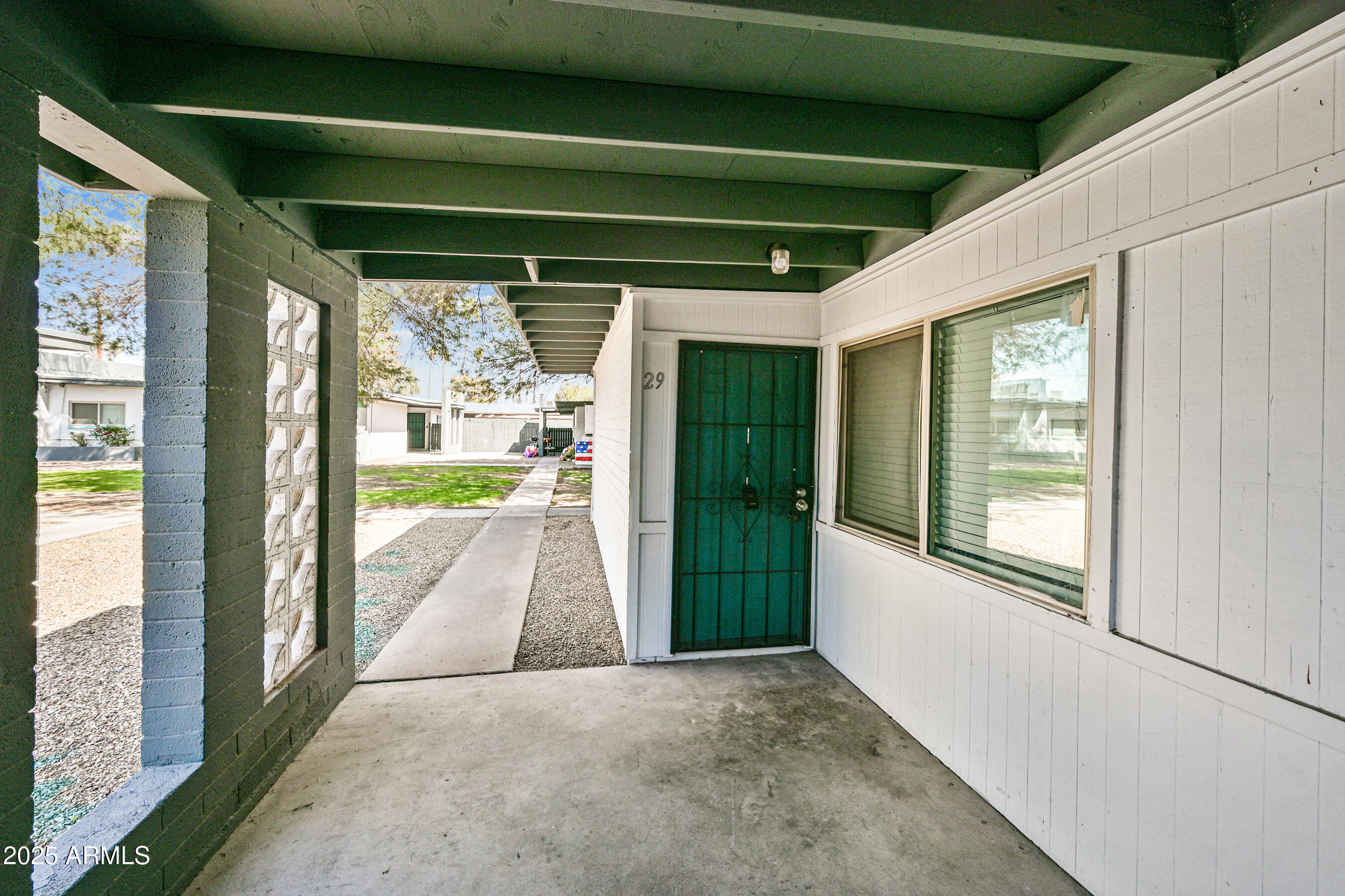 1518 West Colter Street, Unit 29 Phoenix, AZ 85015 - Photo 4 of 15 a view of a porch