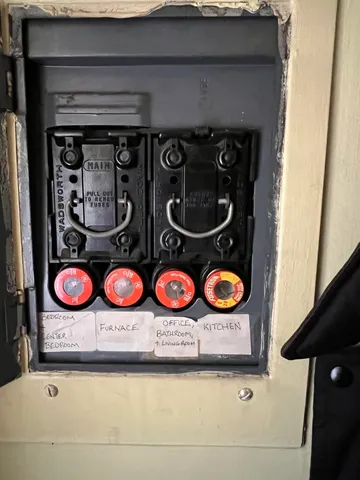 a room with table chairs and window