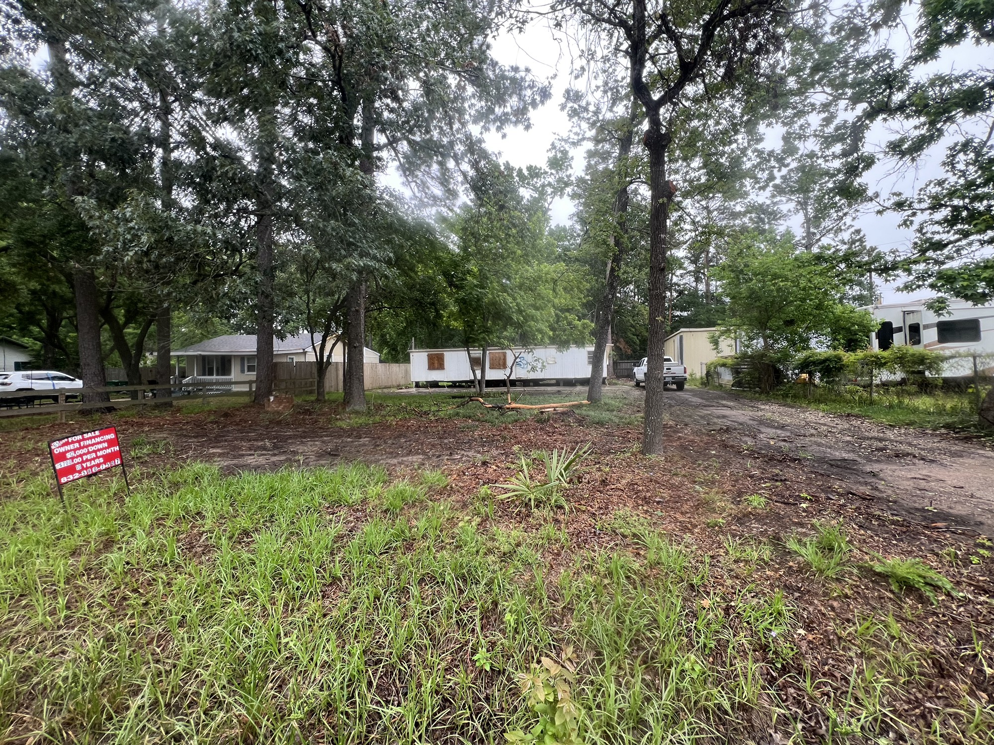 1309 Magnolia Point Drive Houston, TX 77336 - Photo 5 of 10 a view of road with trees