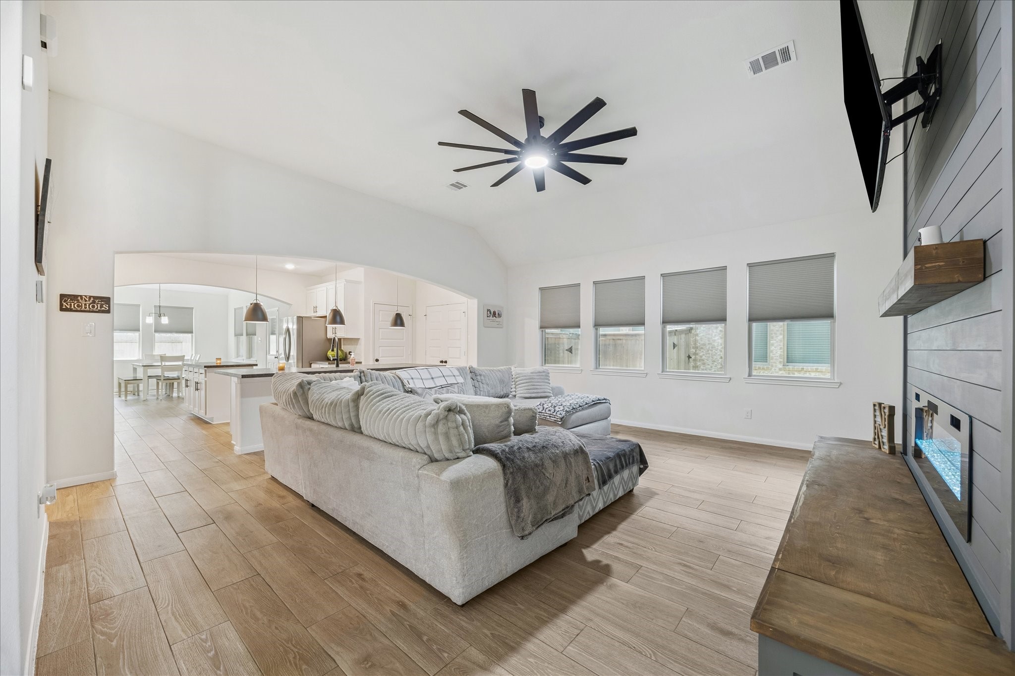 1734 Compass Rose Angleton, TX 77515 - Photo 5 of 23 Open Family space featuring ceramic tile flooring throughout the common areas.