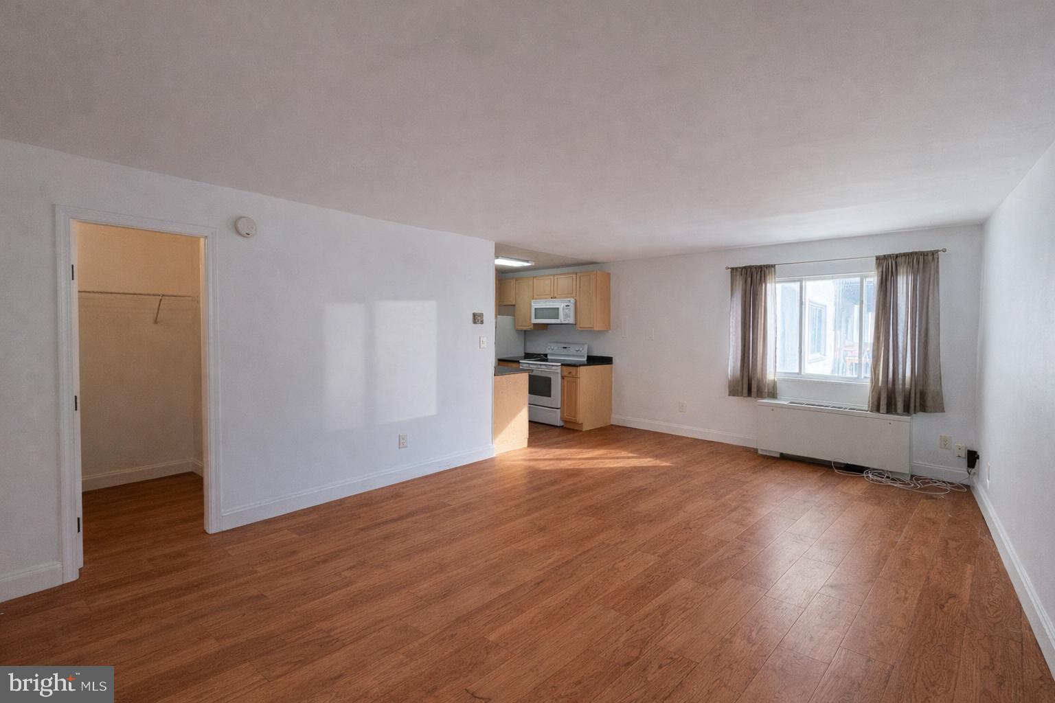 1009 Chillum Road, Unit 205 Hyattsville, MD 20782 - Photo 11 of 16 Room imagined with LVP flooring.