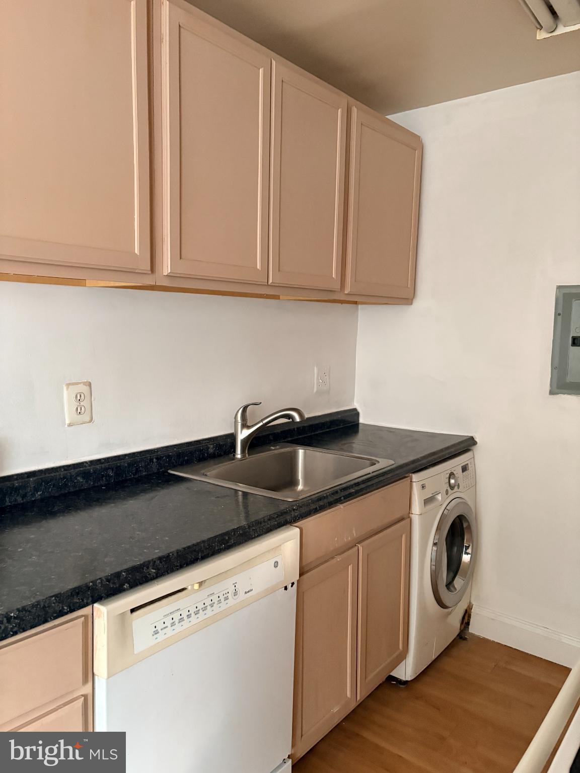 1009 Chillum Road, Unit 205 Hyattsville, MD 20782 - Photo 13 of 16 Galley Kitchen with Washer/Dryer combo.