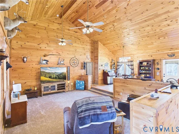 a view of a patio with swimming pool table and chairs