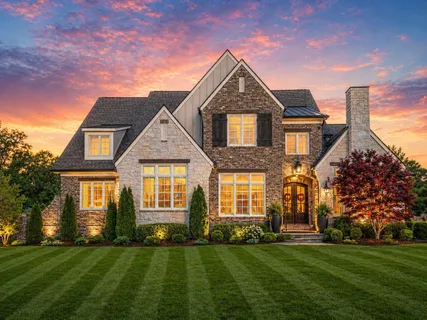 front view of a house next to a yard