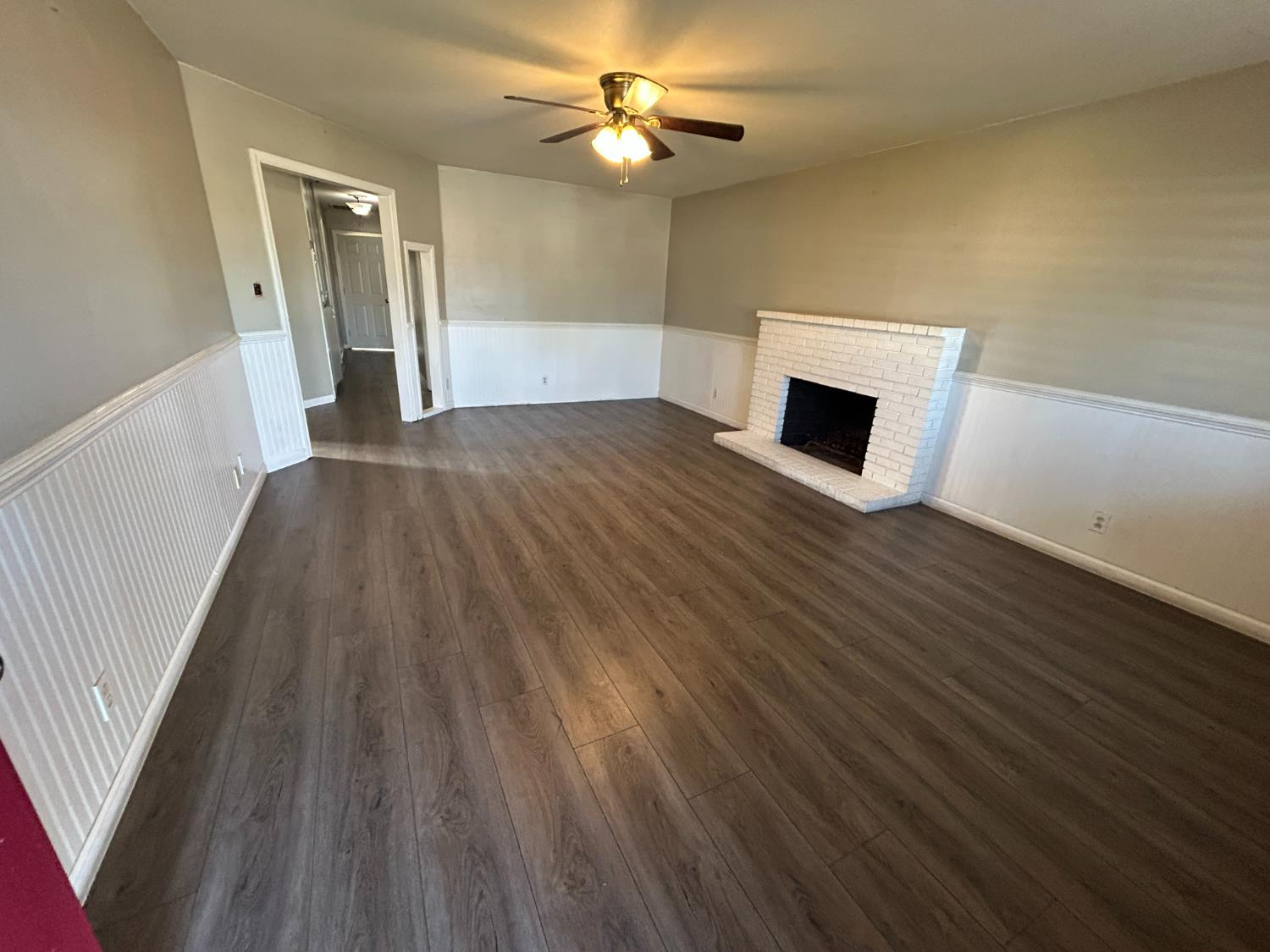 2581 Ballantyne Drive Merced, CA 95341 - Photo 15 of 16 a view of empty room with wooden floor
